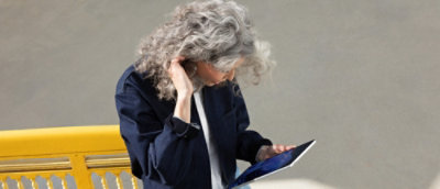 Person using a laptop while working with Microsoft Copilot.